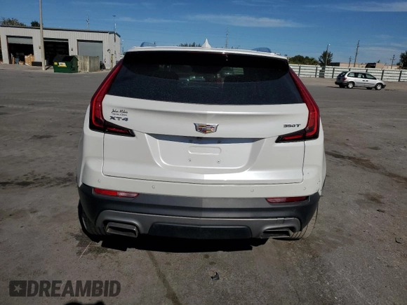 2022 Cadillac XT4 FWD Premium Luxury with VIN 1GYFZCR45NF100049, listed as a Copart auction lot 50213255 with 62,391 mi miles and Salvage title. Bid and sale history available at DreamBid. Image 6.
