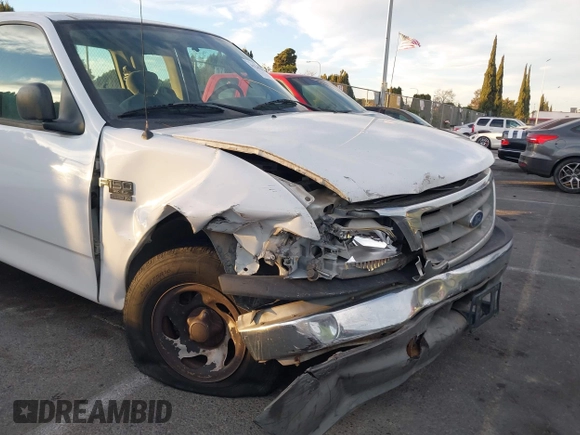 2004 Ford F-150 XL with VIN 2FTRX17W84CA43289, listed as a IAAI auction lot 41248462 with Not provided miles and . Bid and sale history available at DreamBid. Image 6.