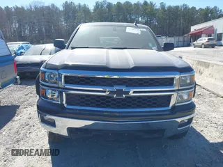 2014 Chevrolet Silverado 1500 LT with VIN 1GCVKREH3EZ320659, listed as a IAAI auction lot 41665352 with 105,574 mi miles and . Bid and sale history available at DreamBid. Image 12.