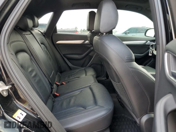 2018 Audi Q3 Premium z VIN WA1BCCFS7JR000434, wystawiony jako Copart lot #54719795 z przebiegiem 108 823 mil mil oraz Szkoda całkowita • Salvage title. Historia ofert i sprzedaży dostępna na DreamBid. Obrazek 11.