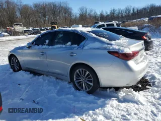 2018 Infiniti Q50 Luxe with VIN JN1EV7AR0JM433540, listed as a Copart auction lot 84282984 with 105,890 mi miles and Salvage Title. Bid and sale history available at carsss.com. Image 2.