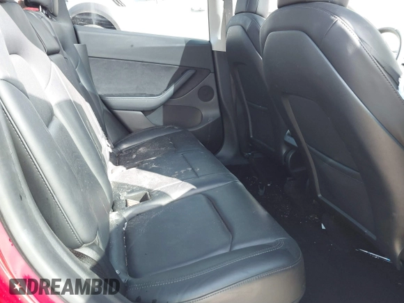 2022 Tesla Model Y Long Range z VIN 7SAYGDEE1NF385414, wystawiony jako IAAI lot #41660542 z przebiegiem 54 075 mil mil oraz . Historia ofert i sprzedaży dostępna na DreamBid. Obrazek 8.