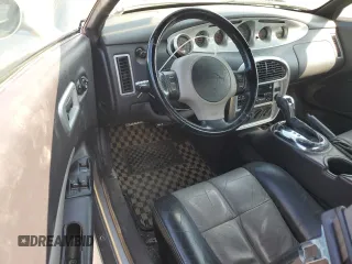 2000 Plymouth Prowler z VIN 1P3EW65G0YV603641, wystawiony jako Copart lot #72117774 z przebiegiem 75 081 mil mil oraz Tytuł czysty. Historia ofert i sprzedaży dostępna na DreamBid. Obrazek 8.