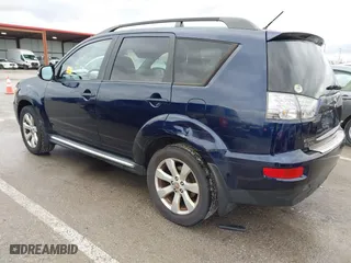 2010 Mitsubishi Outlander XLS with VIN JA4JT4AXXAZ014218, listed as a IAAI auction lot 41443983 with 177,494 mi miles. Bid and sale history available at carsss.com. Image 3.