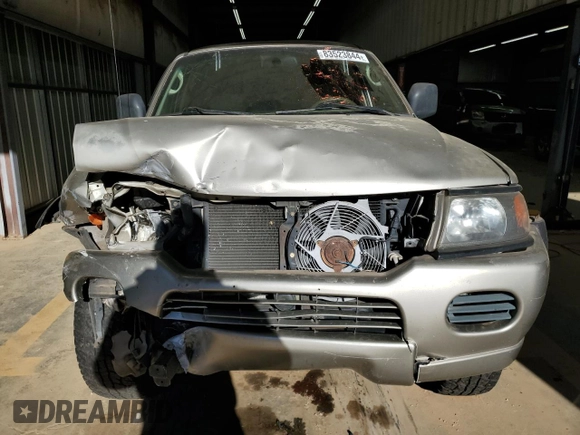 2002 Mitsubishi Montero ES z VIN JA4LS21H32J058330, wystawiony jako Copart lot #83523844 z przebiegiem 186 781 mil mil oraz Szkoda całkowita • Salvage title. Historia ofert i sprzedaży dostępna na DreamBid. Obrazek 5.