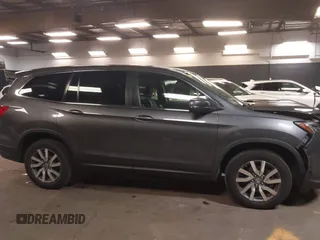 2019 Honda Pilot EX-L with VIN 5FNYF6H57KB062293, listed as a IAAI auction lot 41936964 with 93,012 mi miles and . Bid and sale history available at DreamBid. Image 13.