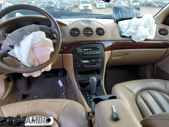 1999 Chrysler 300M M z VIN 2C3HE66G3XH577241, wystawiony jako Copart lot #39567584 z przebiegiem Nie podano mil oraz Nie do naprawy • Non repairable. Historia ofert i sprzedaży dostępna na DreamBid. Obrazek 8.