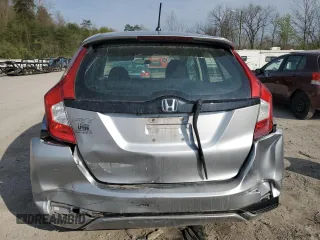 2019 Honda Fit LX z VIN 3HGGK5H41KM712693, wystawiony jako Copart lot #52069275 z przebiegiem 68 522 mil mil oraz Szkoda całkowita • Salvage title. Historia ofert i sprzedaży dostępna na DreamBid. Obrazek 6.