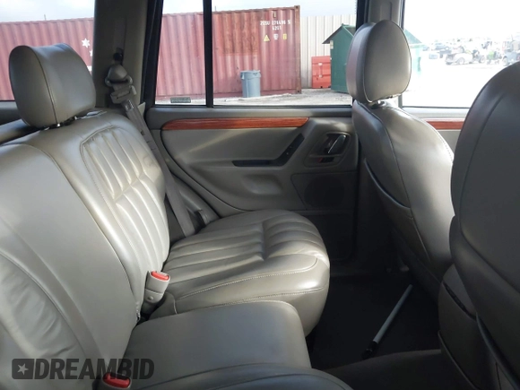 1999 Jeep Grand Cherokee Limited with VIN 1J4GW68N4XC740234, listed as a IAAI auction lot 42499542 with 204,036 mi miles and . Bid and sale history available at DreamBid. Image 8.