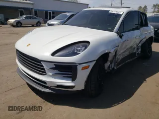 2021 Porsche Macan z VIN WP1AA2A5XMLB09303, wystawiony jako Copart lot #54544005 z przebiegiem Nie podano mil oraz Szkoda całkowita • Salvage title. Historia ofert i sprzedaży dostępna na DreamBid. Obrazek 1.