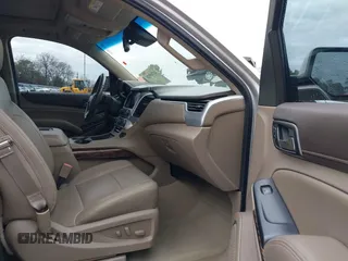 2015 GMC Yukon SLT with VIN 1GKS1BKC7FR628736, listed as a IAAI auction lot 41709926 with 130,254 mi miles. Bid and sale history available at carsss.com. Image 5.