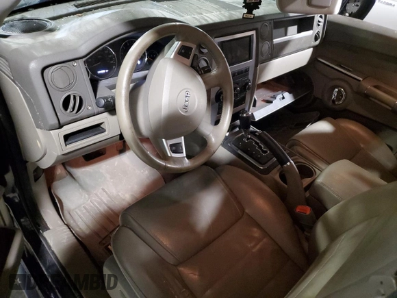 2010 Jeep Commander Sport with VIN 1J4RG4GT7AC113206, listed as a Copart auction lot 56103825 with 174,306 mi miles and Salvage title. Bid and sale history available at DreamBid. Image 8.