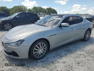 2014 Maserati Ghibli S Q4 with VIN ZAM57RTA8E1095317, listed as a Copart auction lot 66605645 with 120,945 mi miles and Clean title. Bid and sale history available at DreamBid. Image 1.