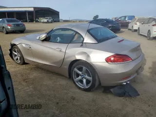 2011 BMW Z4 sDrive30i with VIN WBALM5C5XBE379369, listed as a Copart auction lot 48490475 with 99,425 mi miles and Salvage Title. Bid and sale history available at carsss.com. Image 2.