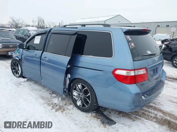 2007 Honda Odyssey EX with VIN 5FNRL384X7B082404, listed as a IAAI auction lot 41303764 with 158,703 mi miles. Bid and sale history available at carsss.com. Image 3.