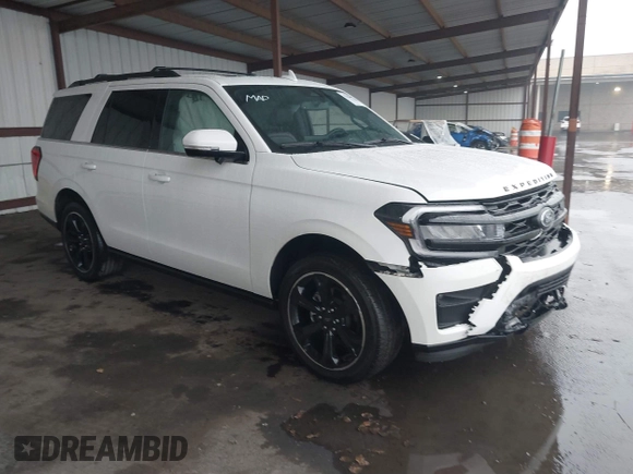 2023 Ford Expedition Limited with VIN 1FMJU2A89PEA47772, listed as a IAAI auction lot 41242800 with 14,512 mi miles. Bid and sale history available at carsss.com. Image 1.