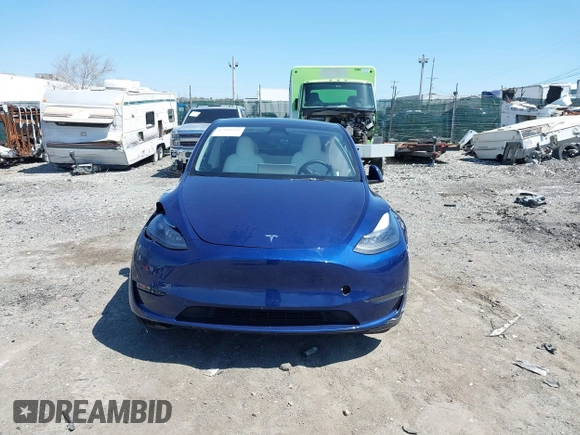 2023 Tesla Model Y Performance z VIN 7SAYGDEF4PF844933, wystawiony jako IAAI lot #42048999 z przebiegiem Nie podano mil oraz . Historia ofert i sprzedaży dostępna na DreamBid. Obrazek 11.