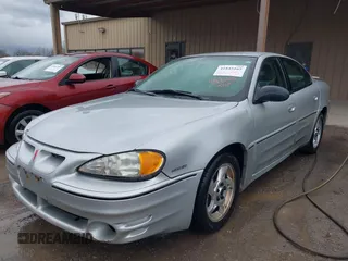 2004 Pontiac Grand Am GT with VIN 1G2NW52EX4C109231, listed as a IAAI auction lot 41845165 with 135,735 mi miles. Bid and sale history available at carsss.com. Image 2.