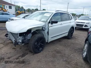 2024 Volkswagen Tiguan SE R-Line Black with VIN 3VV8B7AX3RM111526, listed as a IAAI auction lot 42524100 with 7,280 mi miles and . Bid and sale history available at DreamBid. Image 18.