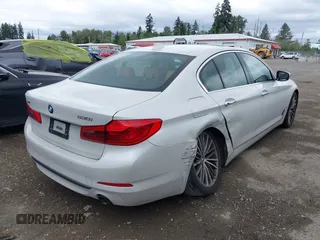 2018 BMW 5 Series 530i xDrive with VIN WBAJA7C5XJWA72470, listed as a IAAI auction lot 42526656 with 66,979 mi miles and . Bid and sale history available at DreamBid. Image 4.