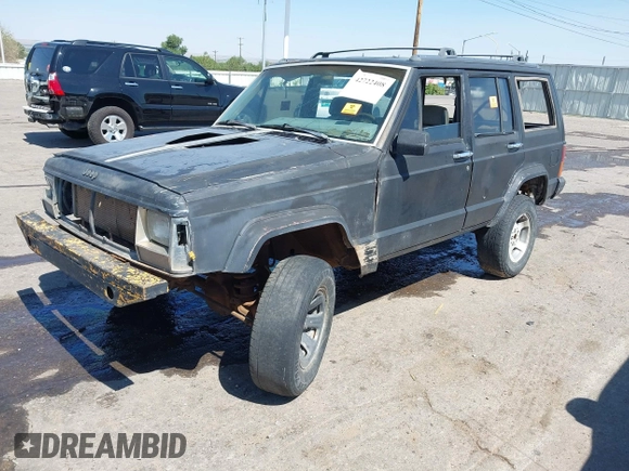 1995 Jeep Cherokee Sport with VIN 1J4FJ68S5SL541413, listed as a IAAI auction lot 42722408 with 335,432 mi miles and . Bid and sale history available at DreamBid. Image 2.