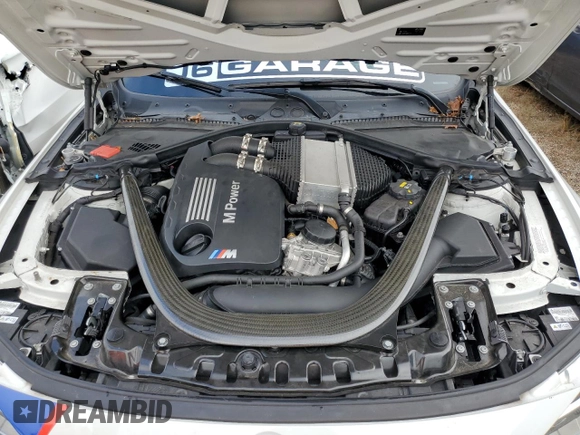 2015 BMW M4 with VIN WBS3R9C54FK333502, listed as a Copart auction lot 64462502 with 76,212 mi miles. Bid and sale history available at carsss.com. Image 7.