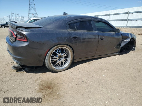 2015 Dodge Charger SXT z VIN 2C3CDXHG3FH800988, wystawiony jako Copart lot #54221905 z przebiegiem 134 098 mil mil oraz Szkoda całkowita • Salvage title. Historia ofert i sprzedaży dostępna na DreamBid. Obrazek 3.