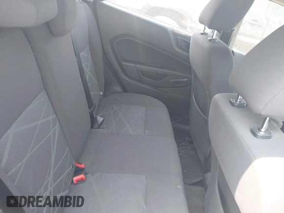 2015 Ford Fiesta S with VIN 3FADP4TJ4FM148740, listed as a IAAI auction lot 42413757 with 77,363 mi miles and . Bid and sale history available at DreamBid. Image 8.
