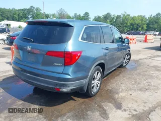 2018 Honda Pilot EX-L with VIN 5FNYF6H52JB050535, listed as a IAAI auction lot 42576721 with 99,280 mi miles and . Bid and sale history available at DreamBid. Image 4.