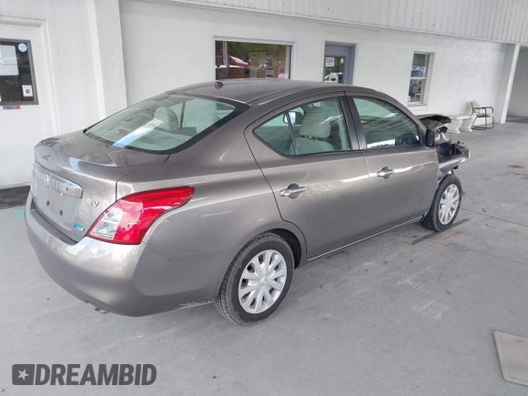 2012 Nissan Versa SV with VIN 3N1CN7AP2CL806435, listed as a IAAI auction lot 40366243 with 72,293 mi miles. Bid and sale history available at carsss.com. Image 4.