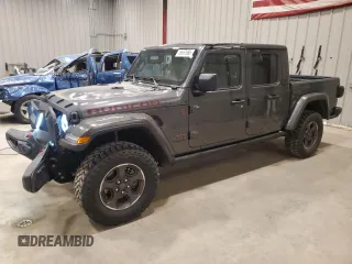 2022 Jeep Gladiator Rubicon z VIN 1C6JJTBG0NL124456, wystawiony jako Copart lot #49657685 z przebiegiem 16 759 mil mil oraz Szkoda całkowita • Salvage title. Historia ofert i sprzedaży dostępna na DreamBid. Obrazek 1.