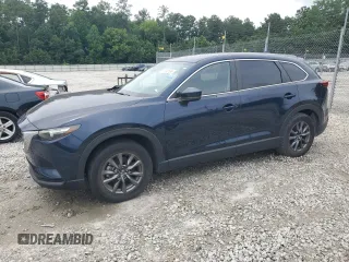 2022 Mazda CX-9 Sport z VIN JM3TCBBY0N0608392, wystawiony jako Copart lot #61090165 z przebiegiem 29 853 mil mil oraz Czysty tytuł • Clean title. Historia ofert i sprzedaży dostępna na DreamBid. Obrazek 1.