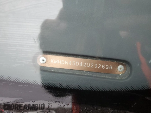 2002 Hyundai Elantra GLS with VIN KMHDN45D42U292698, listed as a Copart auction lot 52349925 with 99,424 mi miles and Salvage title. Bid and sale history available at DreamBid. Image 12.