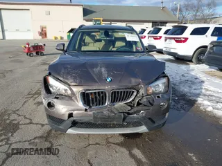 2014 BMW X1 xDrive28i with VIN WBAVL1C56EVY19340, listed as a IAAI auction lot 41340436 with 85,867 mi miles. Bid and sale history available at carsss.com. Image 12.
