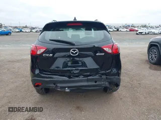2016 Mazda CX-5 Sport with VIN JM3KE2BY4G0761933, listed as a IAAI auction lot 41709274 with 131,127 mi miles. Bid and sale history available at carsss.com. Image 17.