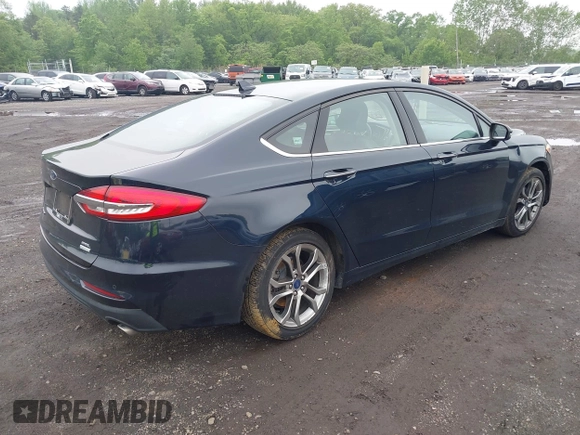 2020 Ford Fusion SEL z VIN 3FA6P0CD9LR183400, wystawiony jako IAAI lot #42271491 z przebiegiem 52 020 mil mil oraz . Historia ofert i sprzedaży dostępna na DreamBid. Obrazek 4.