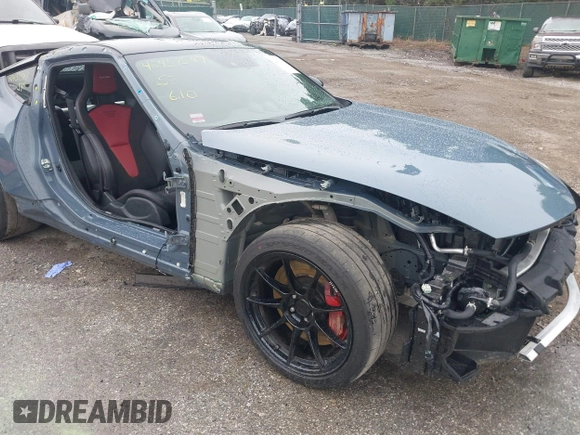 2024 Nissan Z Nismo with VIN JN1BZ4CH9RM360447, listed as a IAAI auction lot 42457597 with 9,723 mi miles and . Bid and sale history available at DreamBid. Image 6.