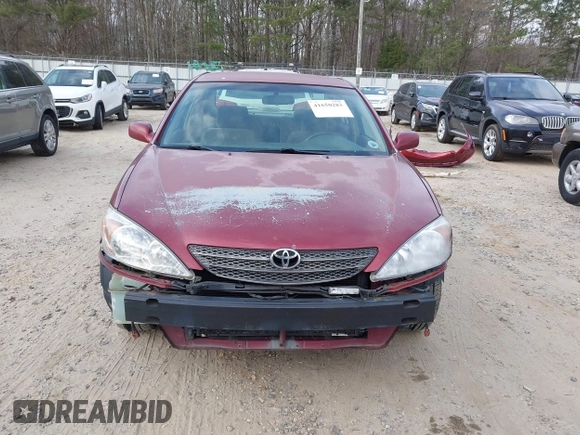 2002 Toyota Camry LE z VIN 4T1BE32K82U005531, wystawiony jako IAAI lot #41650283 z przebiegiem 328 259 mil mil oraz . Historia ofert i sprzedaży dostępna na DreamBid. Obrazek 6.