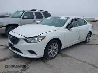 2015 Mazda 6 i Sport with VIN JM1GJ1U68F1170884, listed as a IAAI auction lot 39229424 with 99,317 mi miles. Bid and sale history available at carsss.com. Image 2.