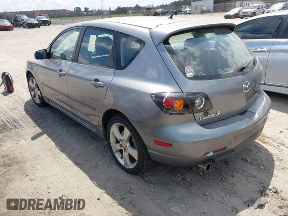 2005 Mazda 3 s with VIN JM1BK343151259901, listed as a IAAI auction lot 42028513 with 209,689 mi miles. Bid and sale history available at carsss.com. Image 3.