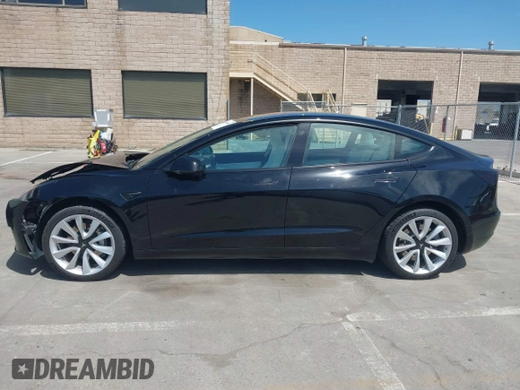 2019 Tesla Model 3 Long Range with VIN 5YJ3E1EB6KF192477, listed as a IAAI auction lot 41981600 with 62,888 mi miles. Bid and sale history available at carsss.com. Image 14.