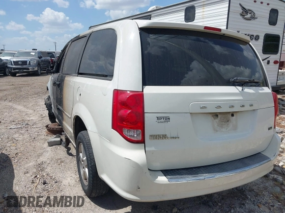 2013 Dodge Grand Caravan SXT with VIN 2C4RDGCG5DR524074, listed as a IAAI auction lot 37312051 with Not Provided miles and . Bid and sale history available at DreamBid. Image 3.