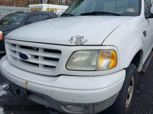 2003 Ford F-150 XL with VIN 1FTRX18W43NB84285, listed as a IAAI auction lot 41494919 with 197,352 mi miles. Bid and sale history available at carsss.com. Image 6.