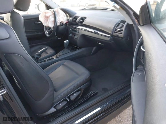 2013 BMW 1 Series 128i with VIN WBAUP9C53DVS95917, listed as a IAAI auction lot 41398338 with 52,160 mi miles. Bid and sale history available at carsss.com. Image 5.