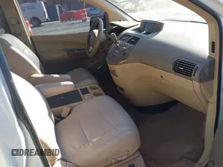 2007 Nissan Quest S with VIN 5N1BV28U77N127494, listed as a IAAI auction lot 41445049 with 210,641 mi miles. Bid and sale history available at carsss.com. Image 5.