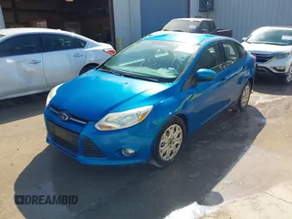 2012 Ford Focus SE with VIN 1FAHP3F24CL415176, listed as a IAAI auction lot 41993864 with 103,805 mi miles. Bid and sale history available at carsss.com. Image 2.