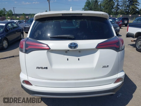 2018 Toyota RAV4 XLE with VIN JTMWFREV3JD130995, listed as a IAAI auction lot 42183630 with 56,624 mi miles. Bid and sale history available at carsss.com. Image 17.