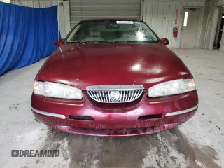 1997 Mercury Cougar z VIN 1MELM62WXVH603342, wystawiony jako Copart lot #56543965 z przebiegiem 151 497 mil mil oraz Czysty tytuł • Clean title. Historia ofert i sprzedaży dostępna na DreamBid. Obrazek 5.