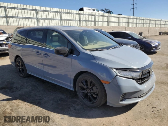 2023 Honda Odyssey Sport with VIN 5FNRL6H77PB052532, listed as a Copart auction lot 50596275 with 23,457 mi miles and Salvage Title. Bid and sale history available at carsss.com. Image 4.