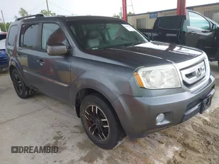 2010 Honda Pilot Touring z VIN 5FNYF3H93AB004598, wystawiony jako IAAI lot #42755136 z przebiegiem 187 990 mil mil oraz . Historia ofert i sprzedaży dostępna na DreamBid. Obrazek 1.